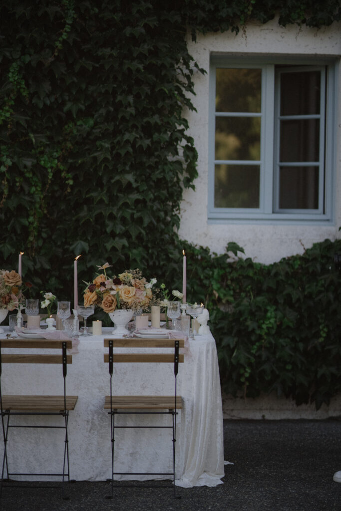 wedding tablescape against an ivy backdrop