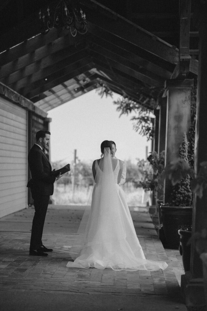 bride and groom stand in front of everyone at abeja winery wedding
