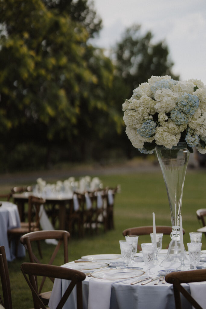blue and white tablescape with towering hydrangeas